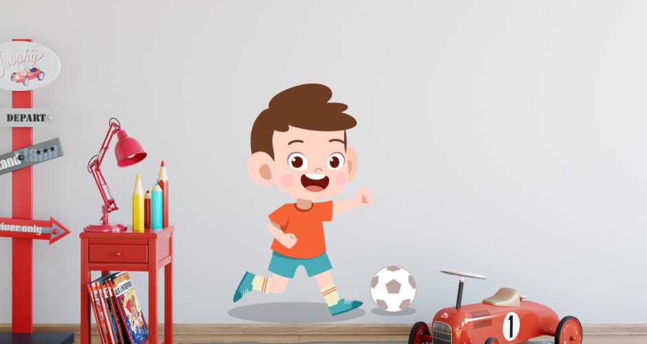 Αυτοκόλλητα Τοίχου - Χαρούμενο παιδάκι που παίζει ποδόσφαιρο